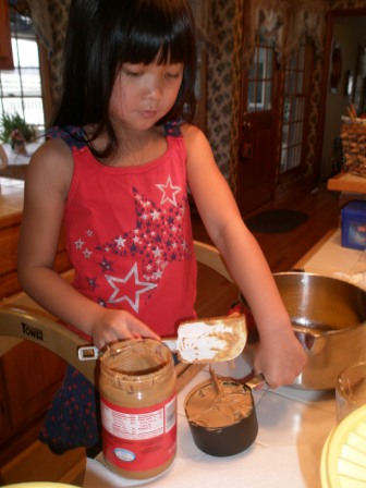 Kasen making peanut butter cookies